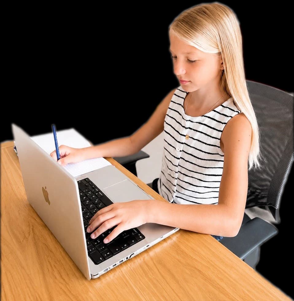 A child practising on a laptop